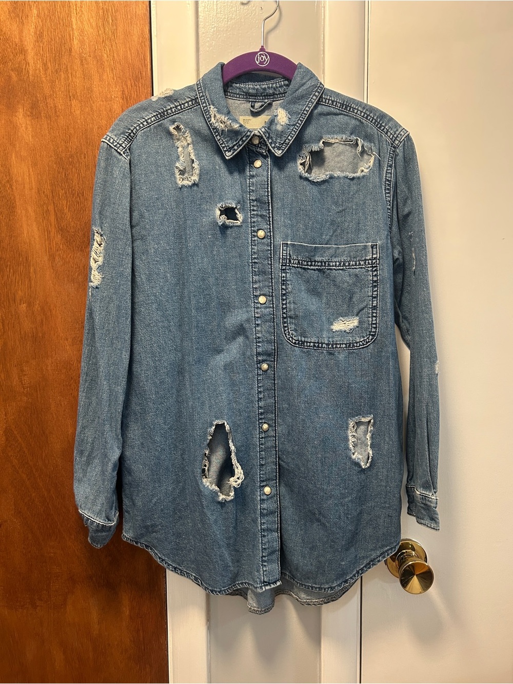 Distressed denim top